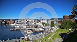 OSLO, NORWAY Ã¢â¬â AUGUST 17, 2016: View of panorama on Oslo Harbour and Oslo City Hall from Akershus fortress in Oslo, Norway on A